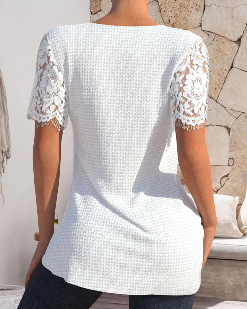 ND | Blouse en dentelle structurée