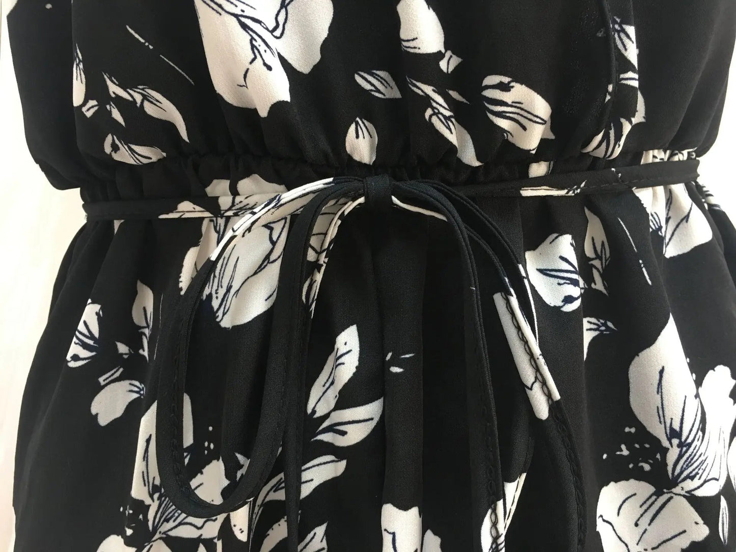 EP | Jumpsuit à fleurs et taille haute