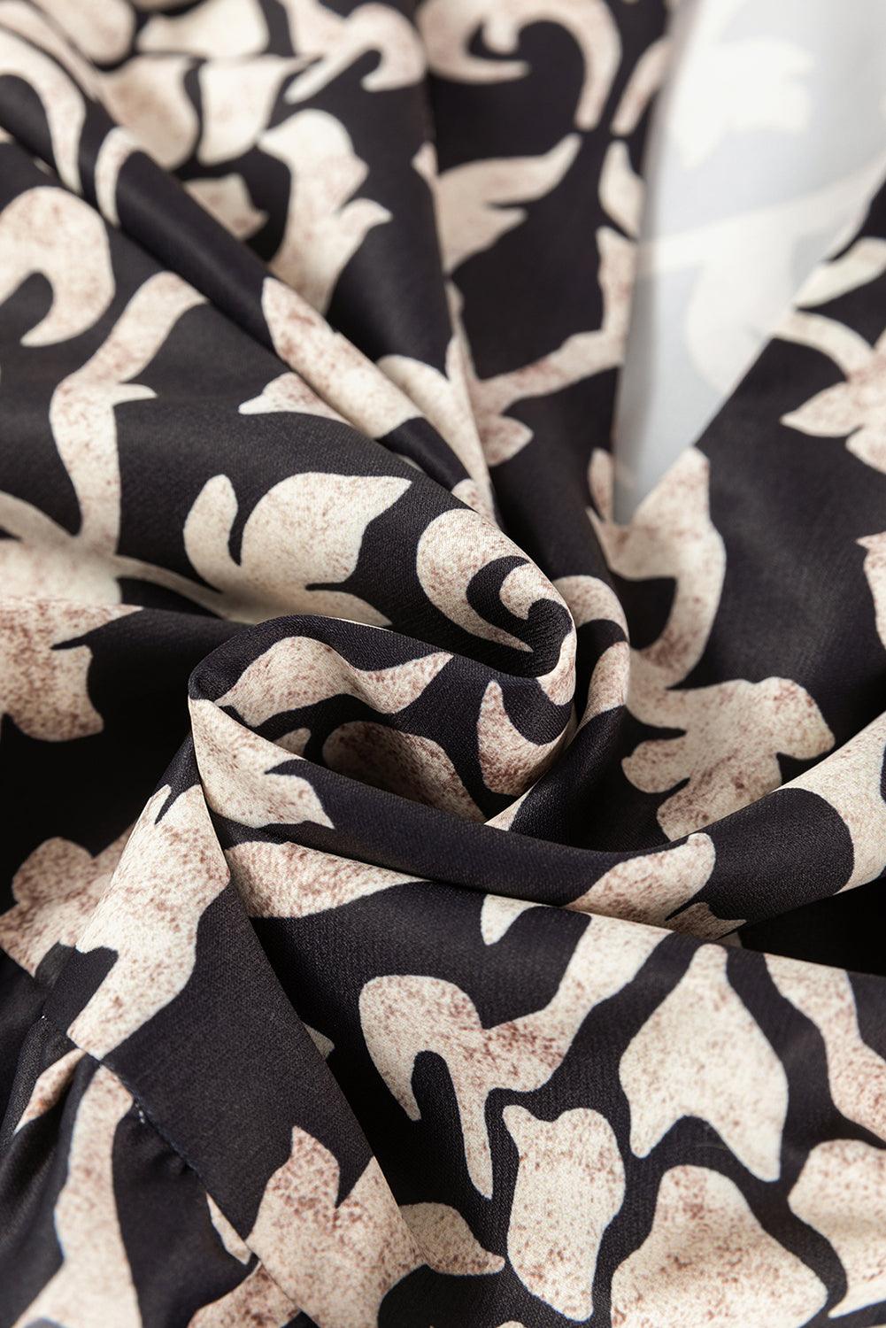 EP | Élégance avec une mini-robe noire pour femme au look vintage