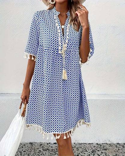 ND | Tania - Mini-robe bleue groovy à manches courtes