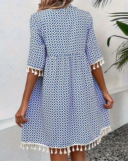 ND | Tania - Mini-robe bleue groovy à manches courtes