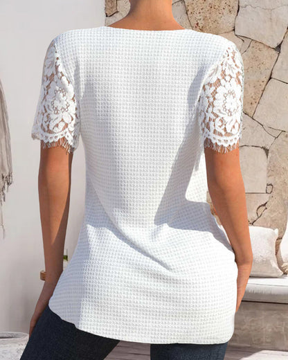 ND | Blouse en dentelle structurée