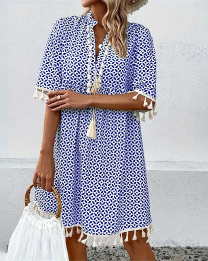 ND | Tania - Mini-robe bleue groovy à manches courtes