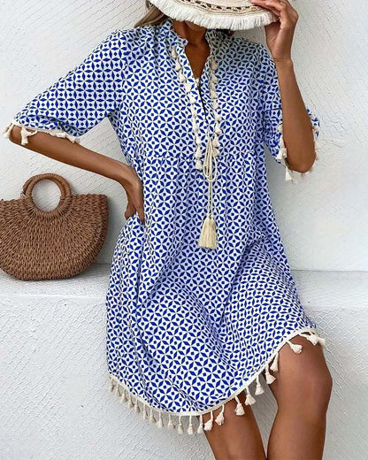 ND | Tania - Mini-robe bleue groovy à manches courtes