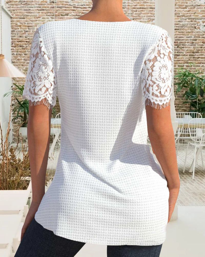 ND | Blouse en dentelle structurée