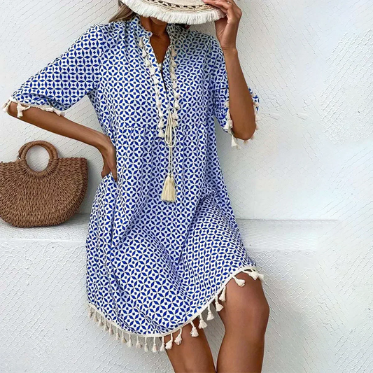 EP | Mini-robe bleue groovy à manches courtes.