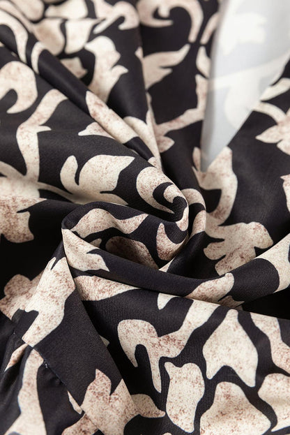 EP | Élégance avec une mini-robe noire pour femme au look vintage