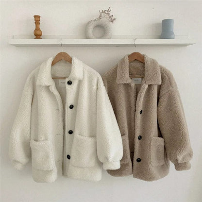 EP | Manteau en peau d'agneau à un bouton avec col polo ample