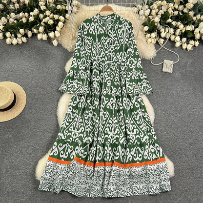 EP | Longue robe vintage imprimée avec décolleté en V et manches évasées